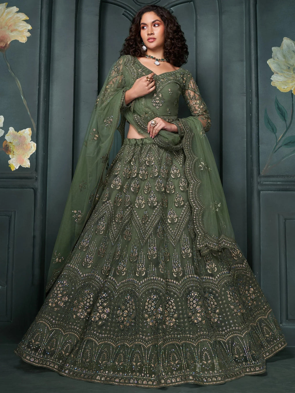 Magnetic Green Embroidered Net Bridesmaid Lehenga Choli With Dupatta
