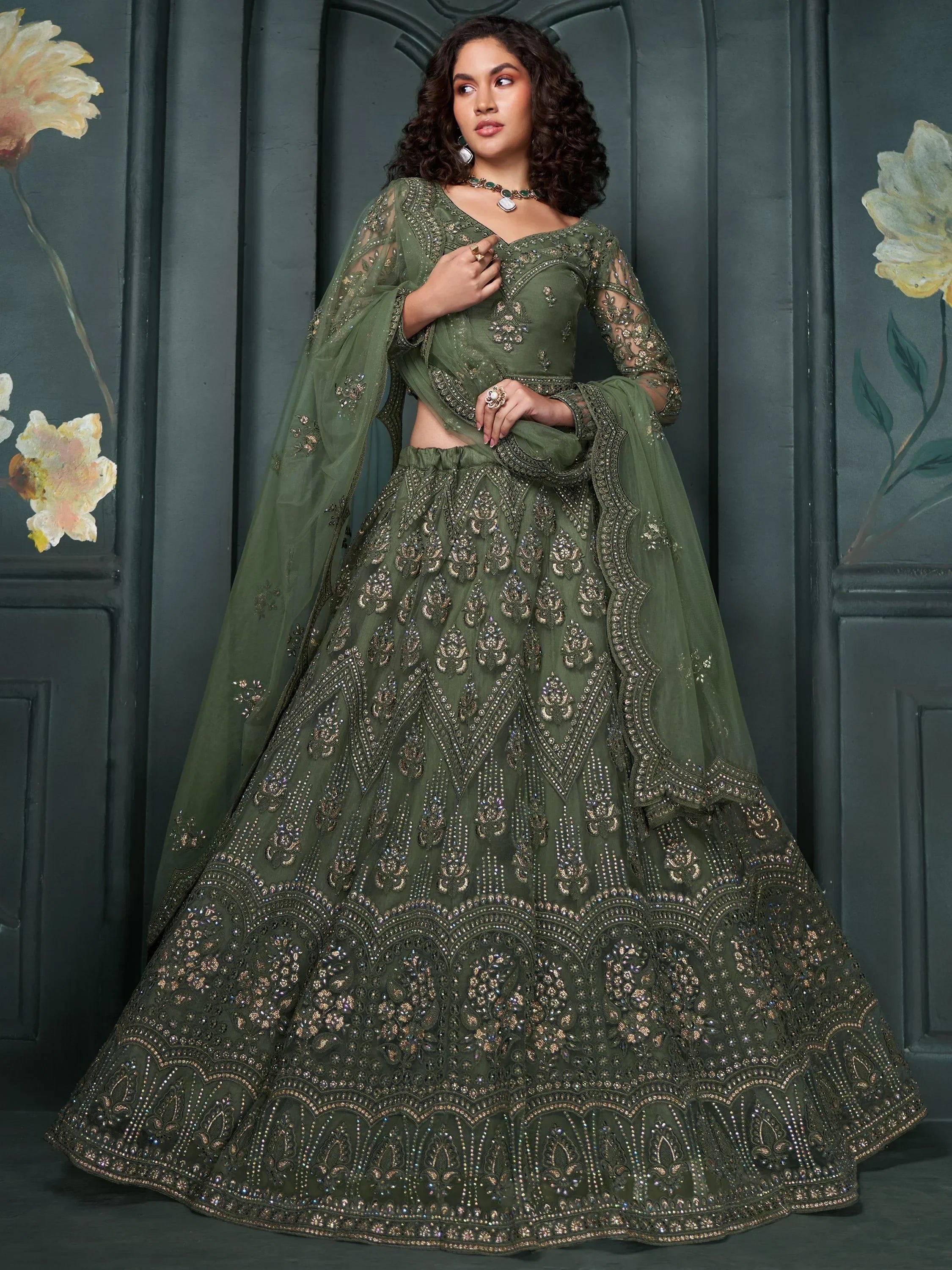 Magnetic Green Embroidered Net Bridesmaid Lehenga Choli With Dupatta