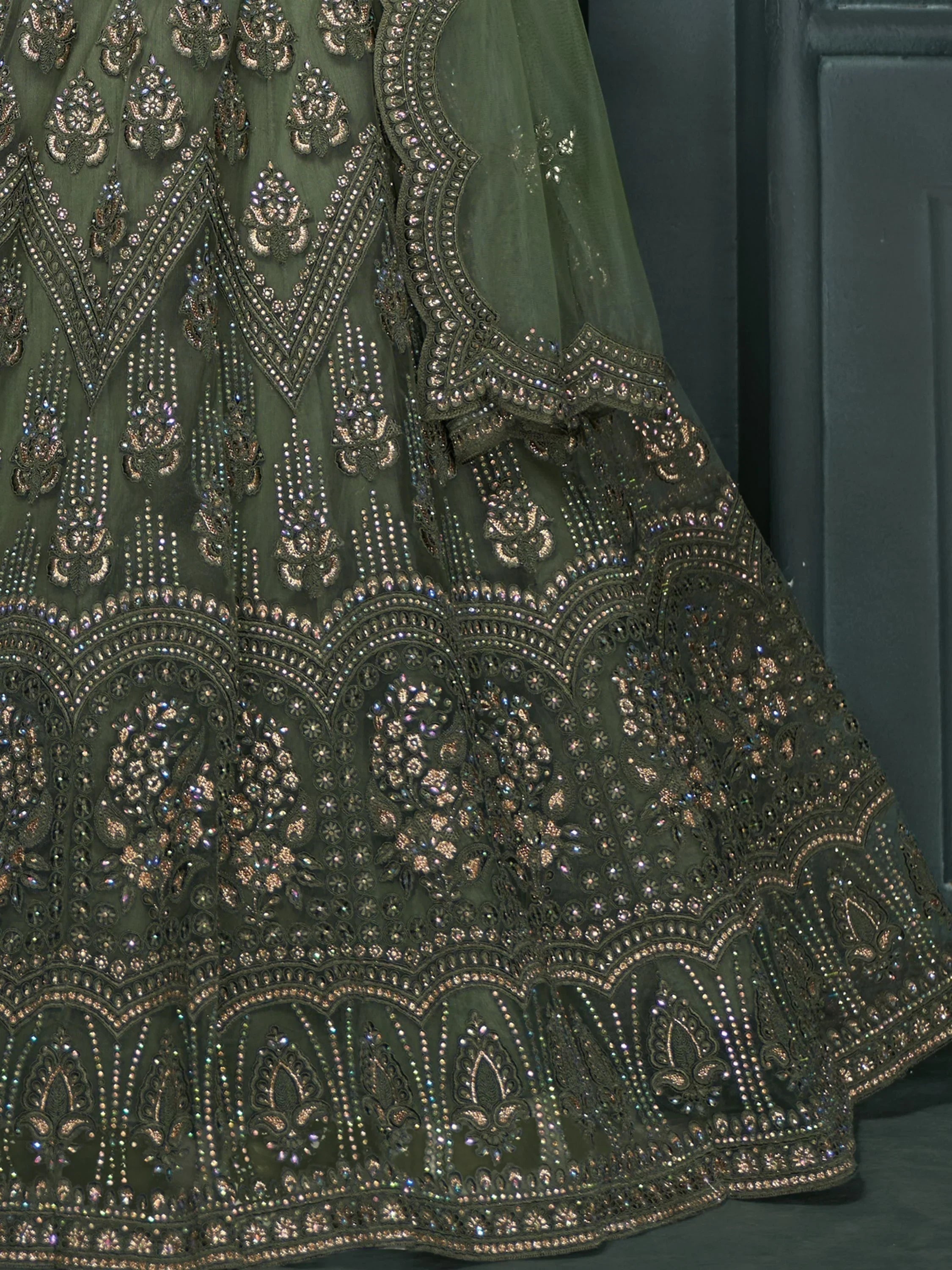 Magnetic Green Embroidered Net Bridesmaid Lehenga Choli With Dupatta