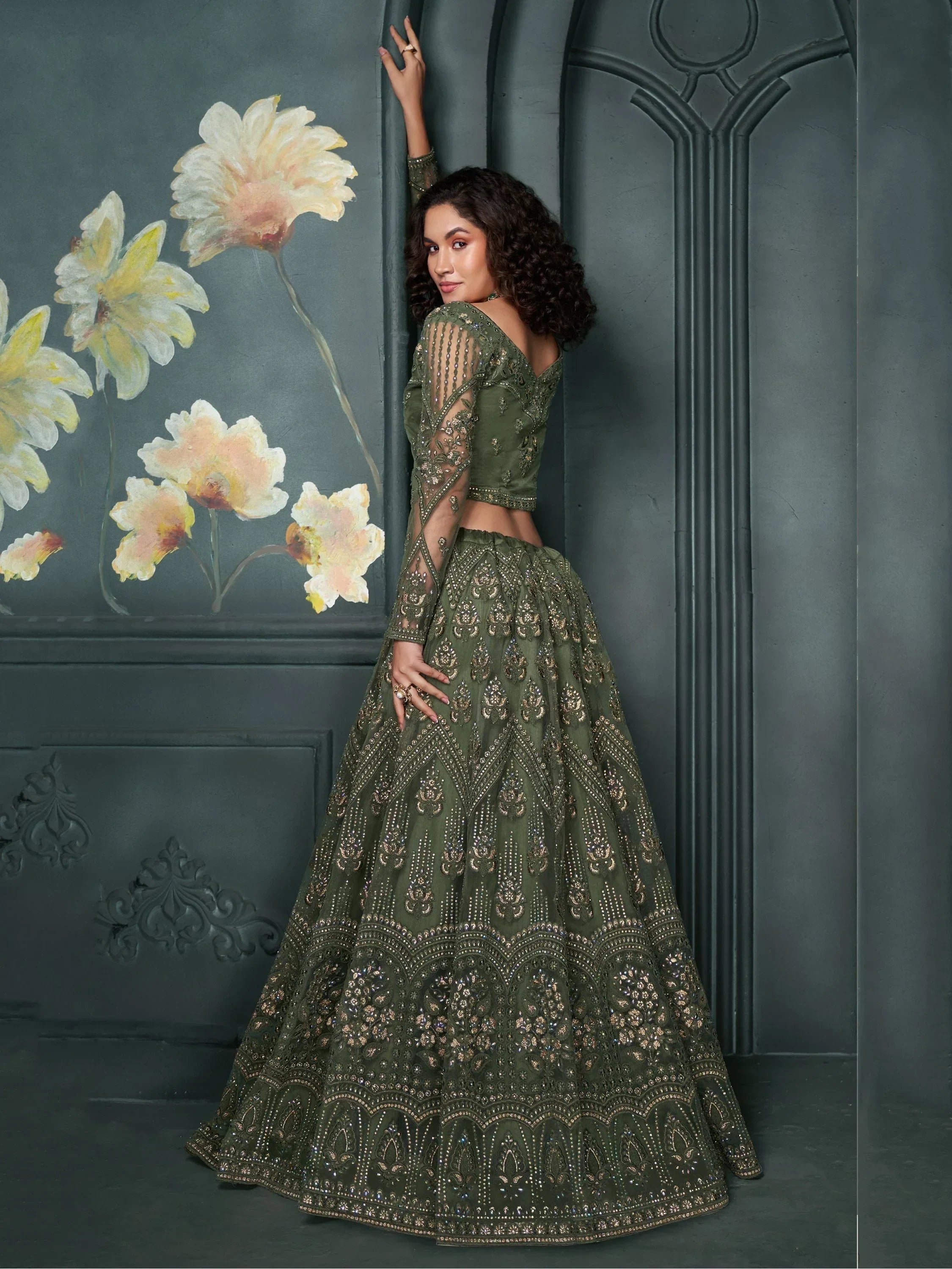 Magnetic Green Embroidered Net Bridesmaid Lehenga Choli With Dupatta