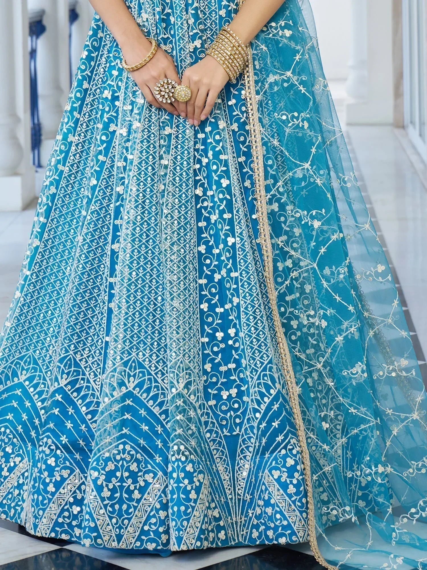 Marvelous Sky Blue Embroidered Net Designer Lehenga Choli