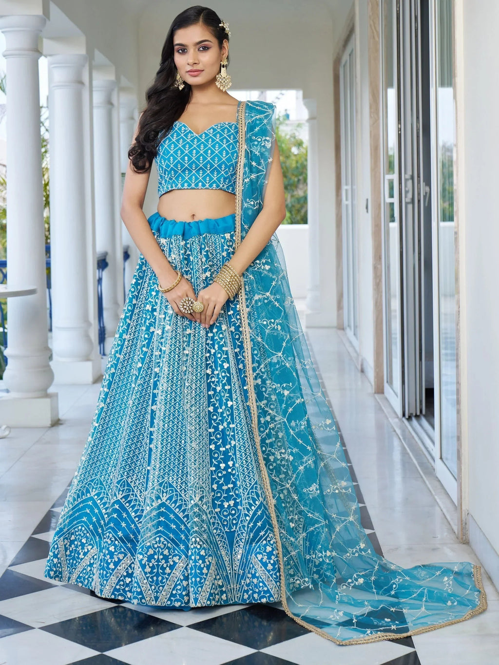 Marvelous Sky Blue Embroidered Net Designer Lehenga Choli