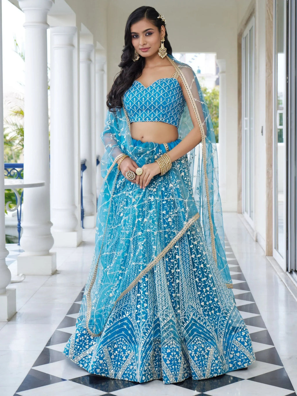 Marvelous Sky Blue Embroidered Net Designer Lehenga Choli