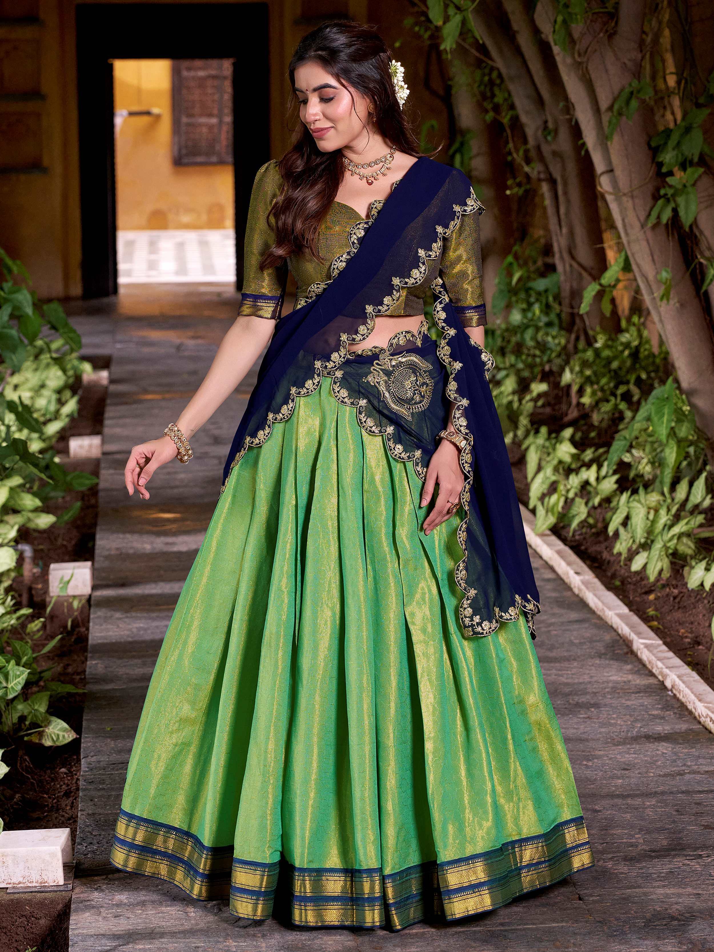 Green Magnetic Kanchipuram Silk Zari Weaving Half Saree Lehenga