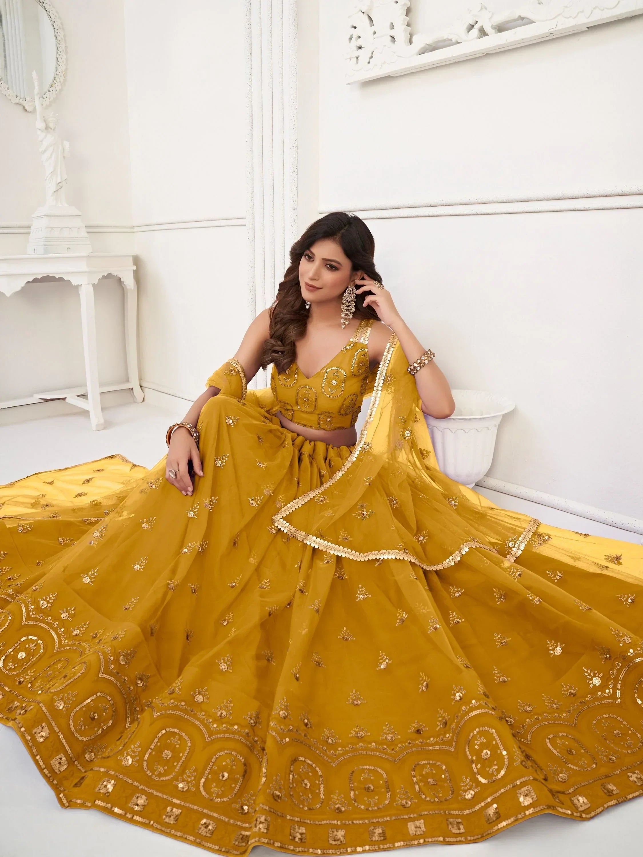 Yellow Pretty Sequins Butterfly Net Party Wear Lehenga Choli