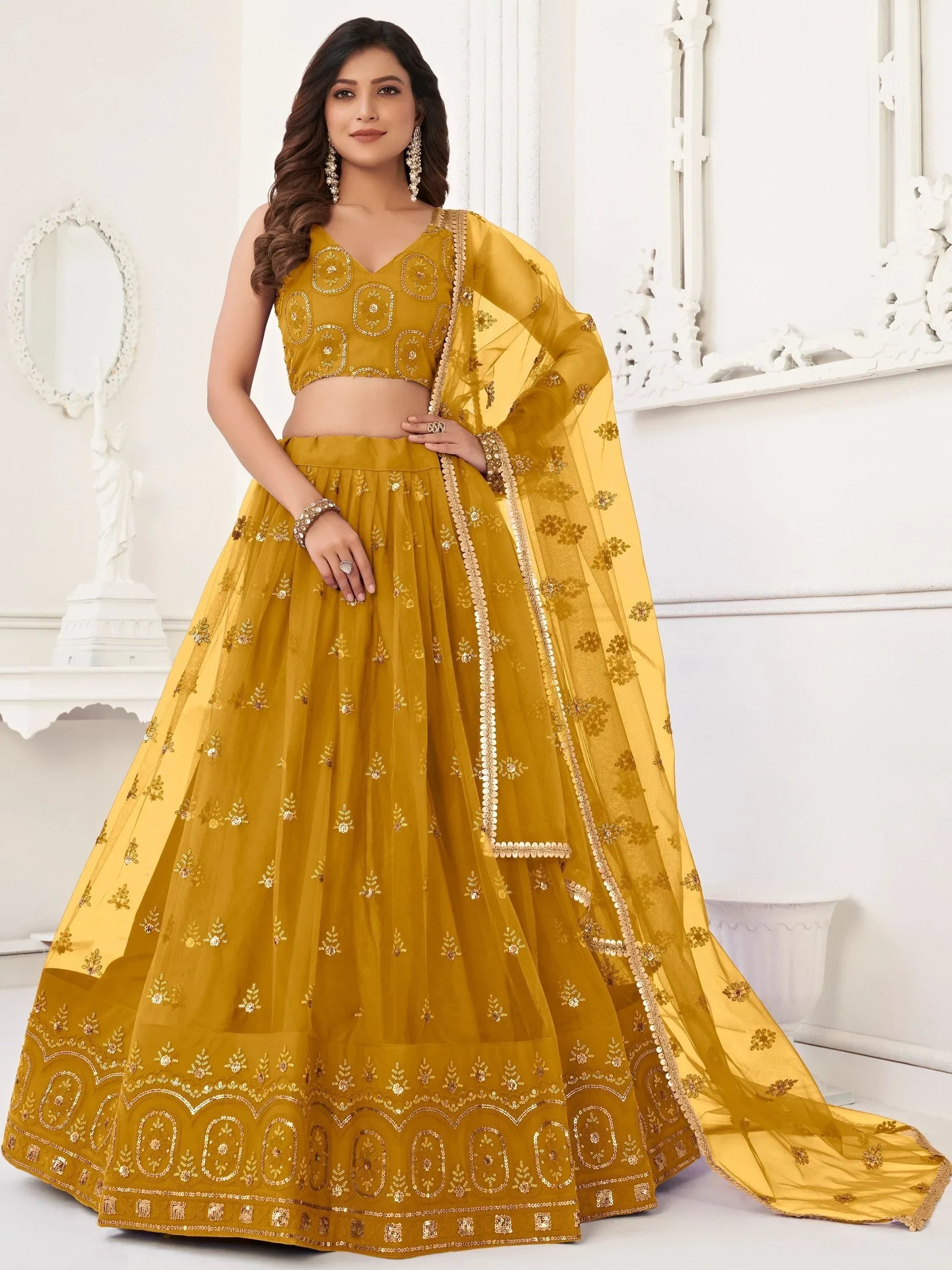 Yellow Pretty Sequins Butterfly Net Party Wear Lehenga Choli
