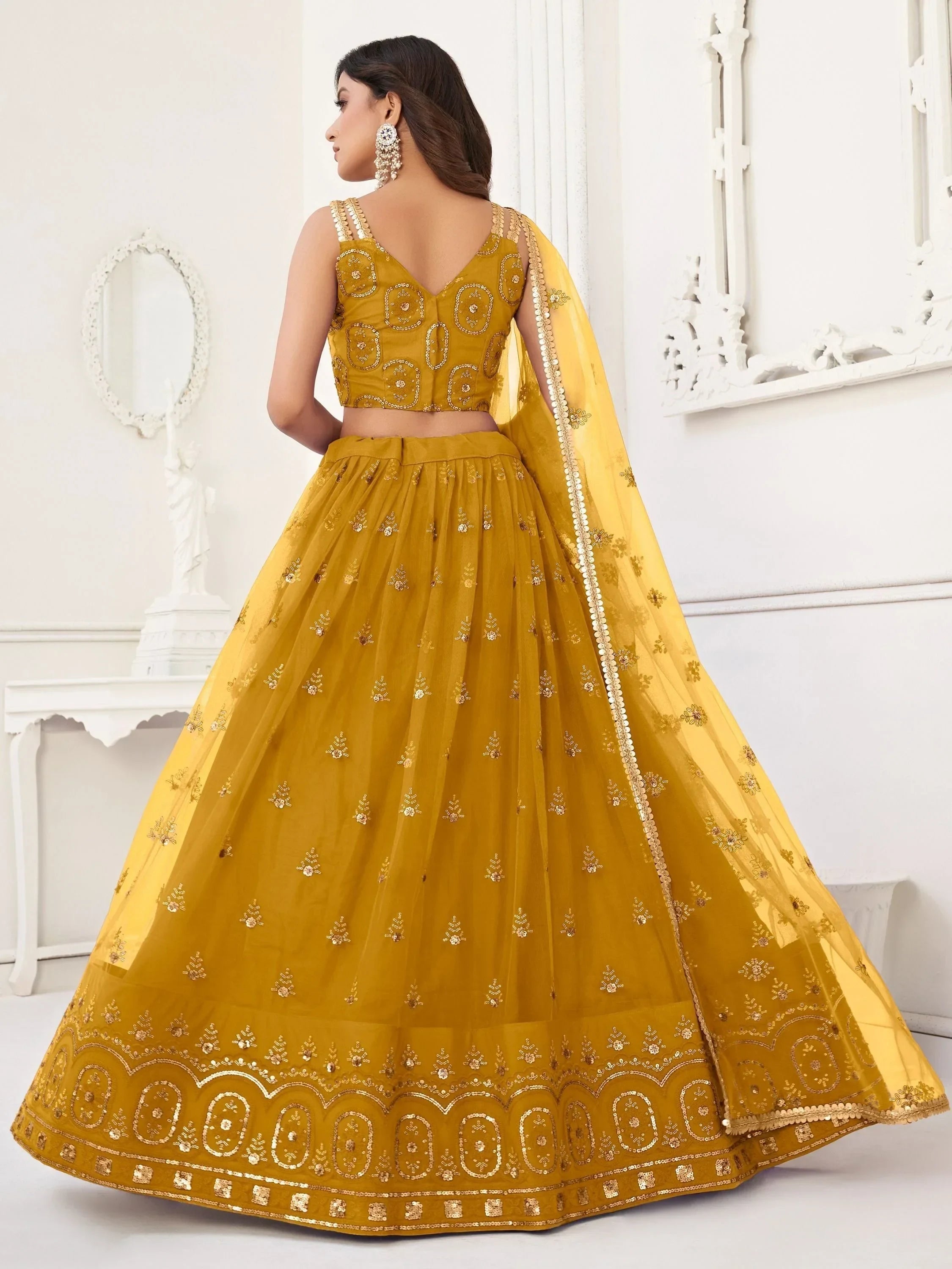Yellow Pretty Sequins Butterfly Net Party Wear Lehenga Choli