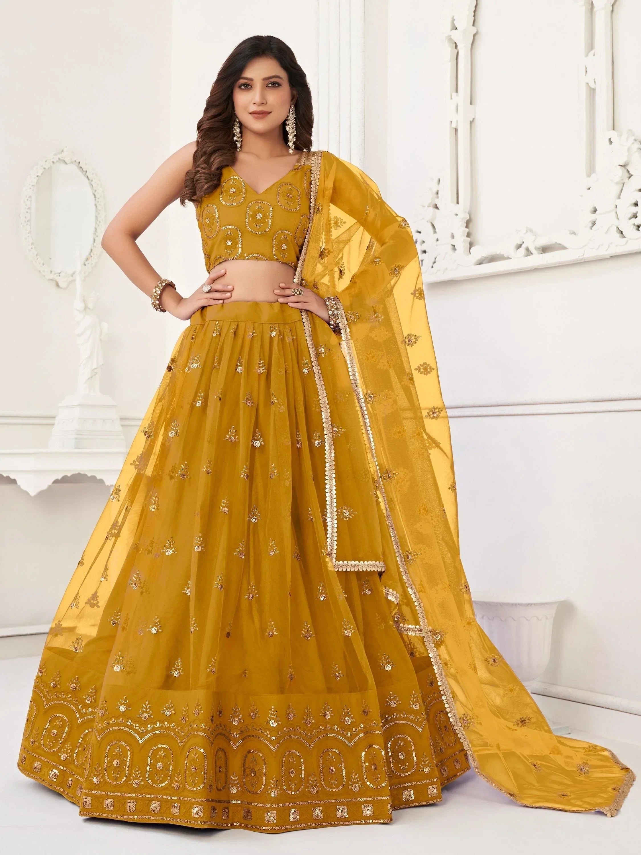 Yellow Pretty Sequins Butterfly Net Party Wear Lehenga Choli