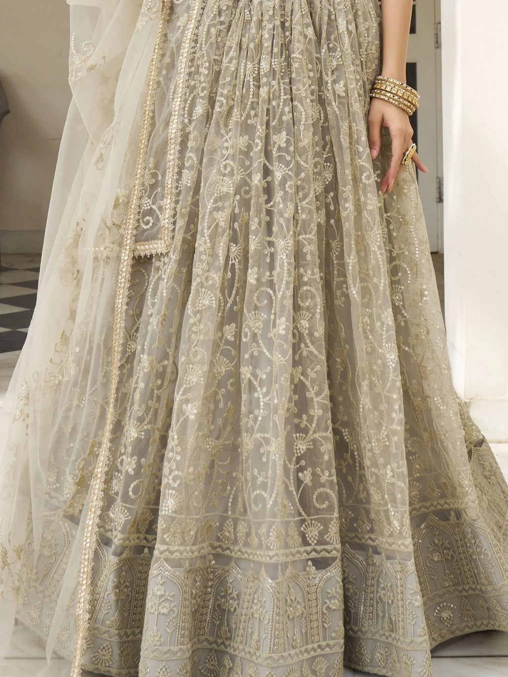 Mesmerizing Ivory Sequins Net Engagement Wear Lehenga Choli