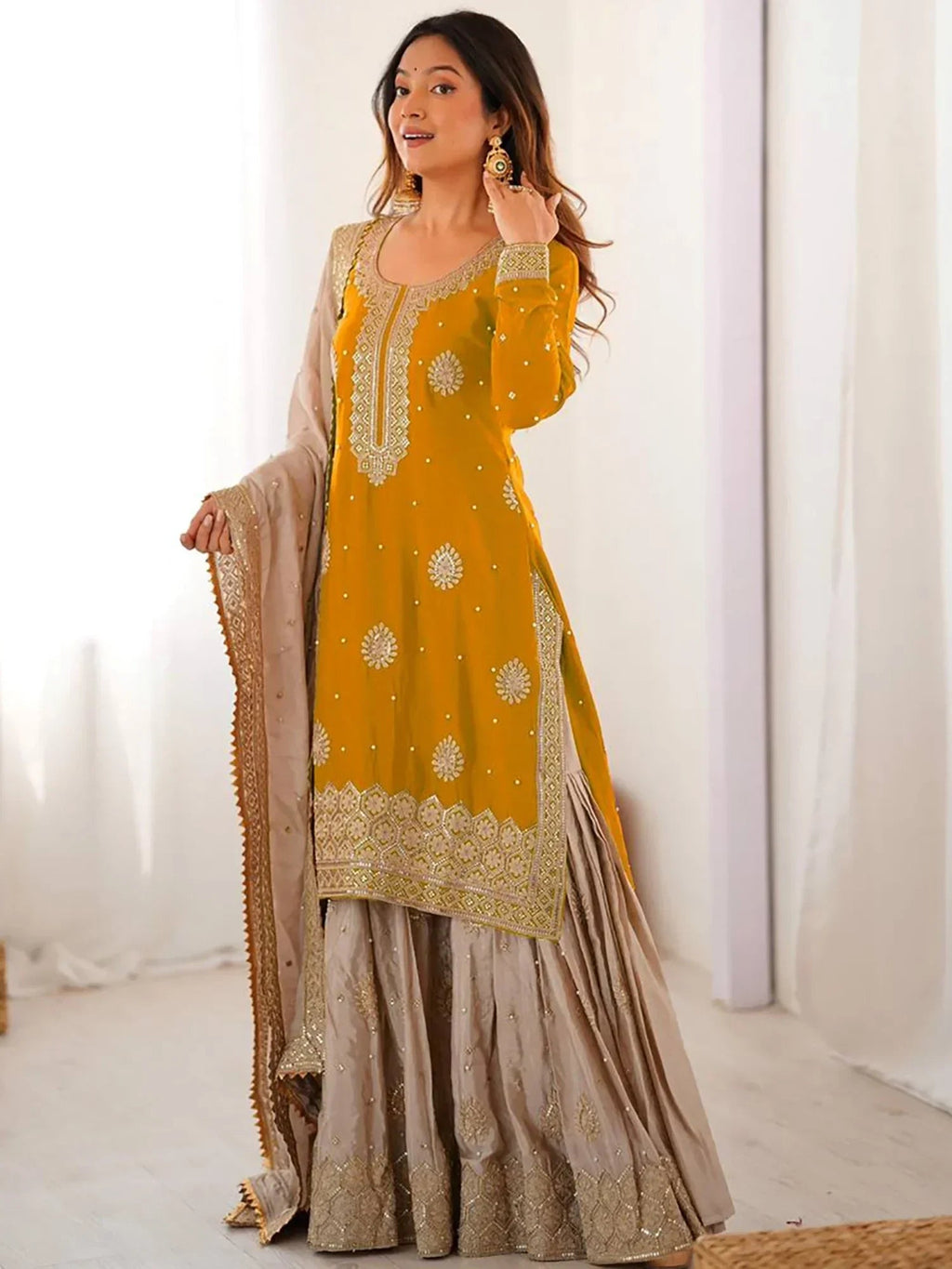 Yellow Gorgeous Embroidered Silk Festival Wear Sharara Suit With Dupatta