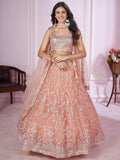 Pretty Peach Sequins Soft Net Engagement Wear Lehenga Choli