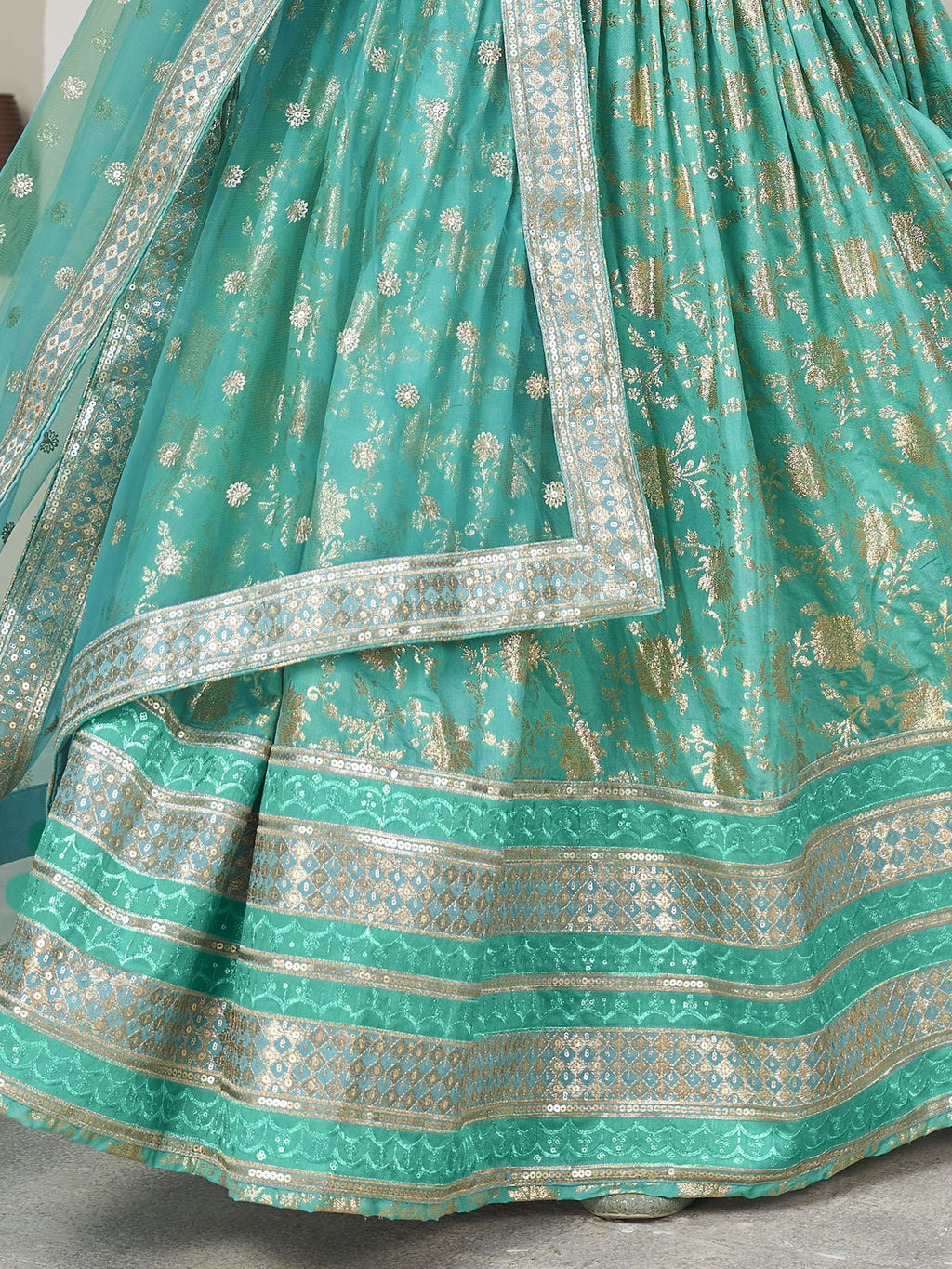 Captivating Sea Green Zari Embroidered Jacquard Lehenga Choli