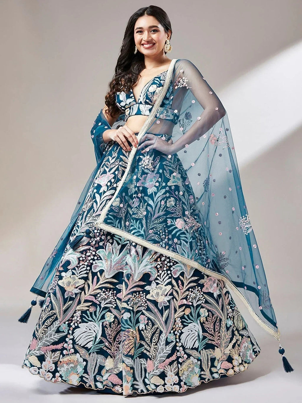 Teal Ravishing Color Sequins Soft Net Party Wear Lehenga Choli