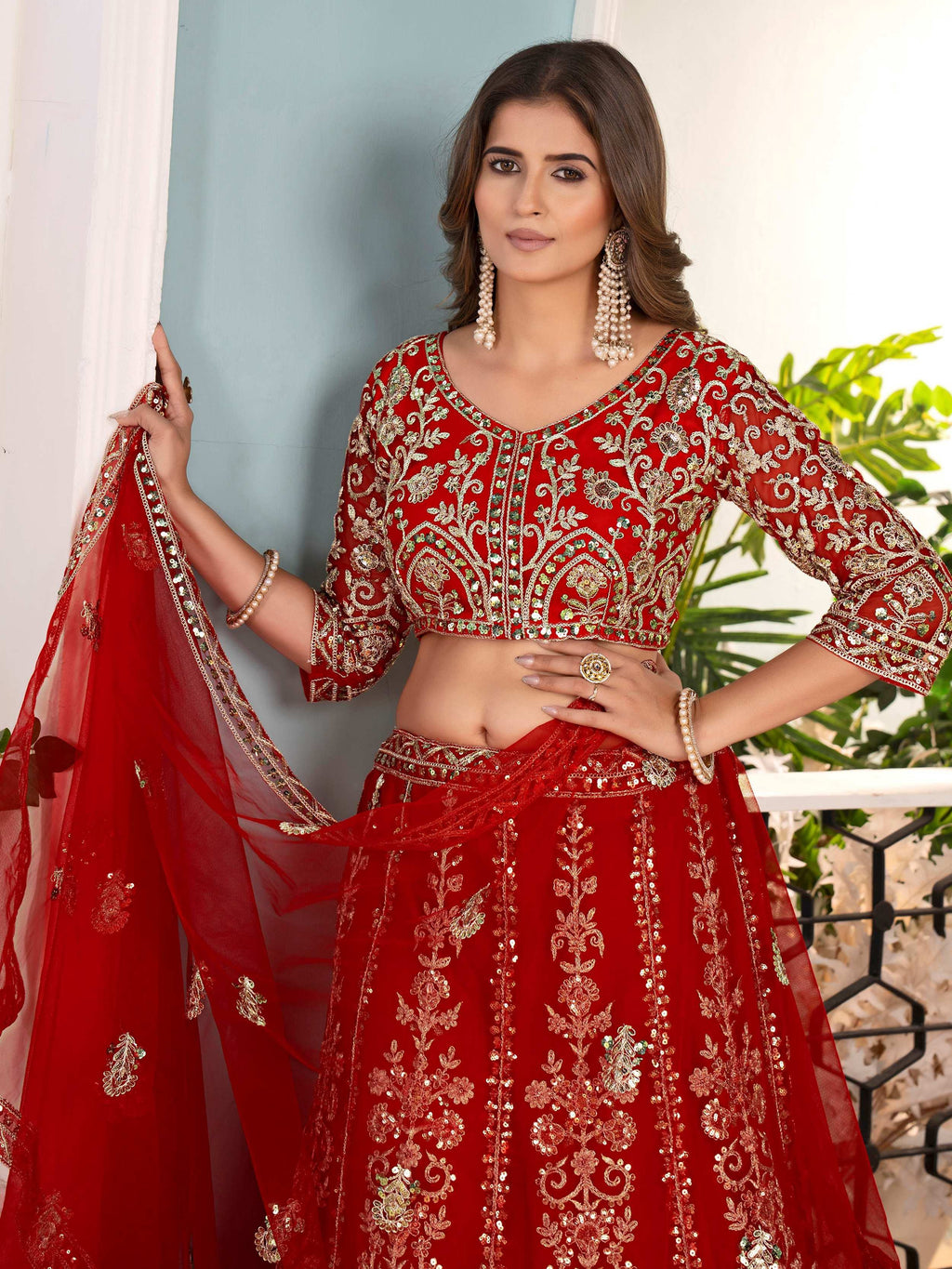 Red Captivating Net Sequins Embroidered Bridesmaid Lehenga Choli