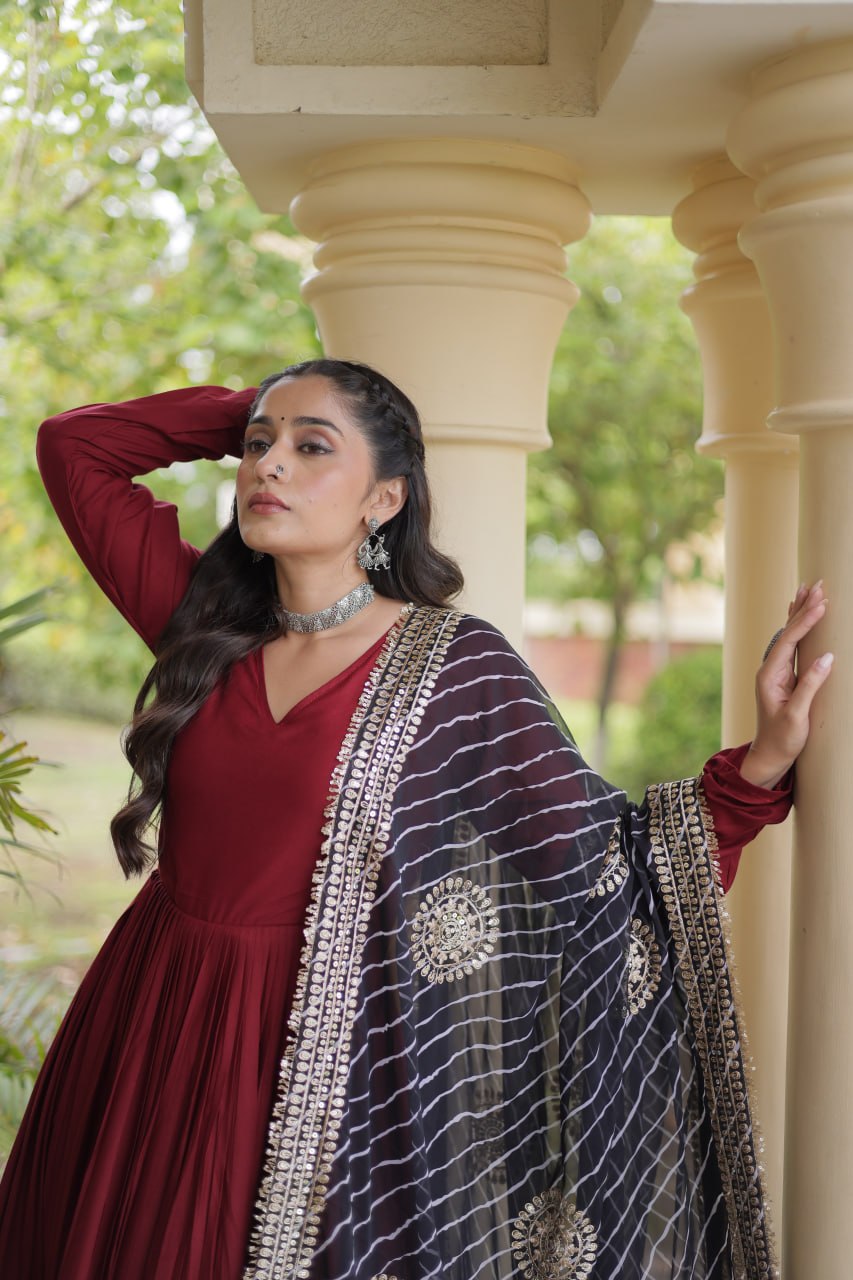 Reyon Gown with Gota Patti Lace Work and Leheriya Printed Georgette Dupatta
