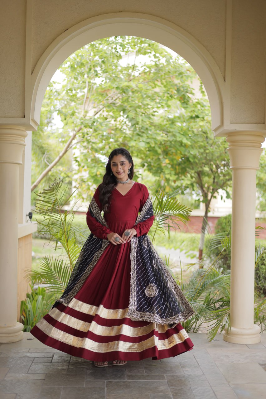 Reyon Gown with Gota Patti Lace Work and Leheriya Printed Georgette Dupatta