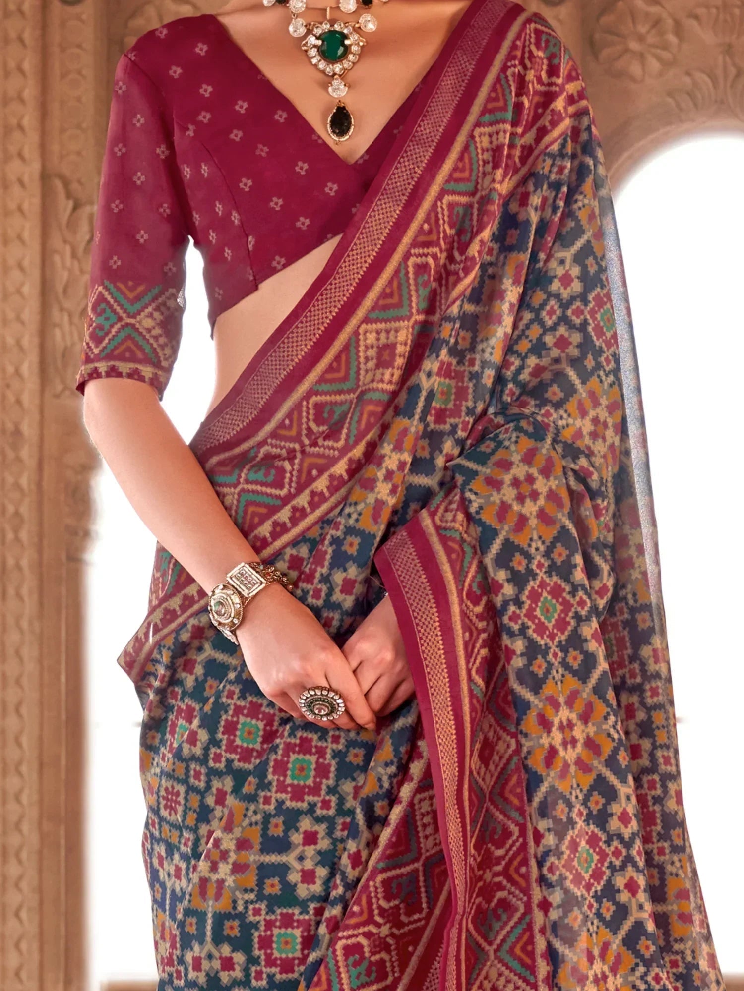 Captivating Navy Blue Patola Printed Georgette Saree With Blouse