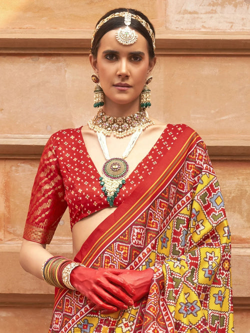 Attractive Mustard Yellow Patola Printed Silk Saree With Blouse