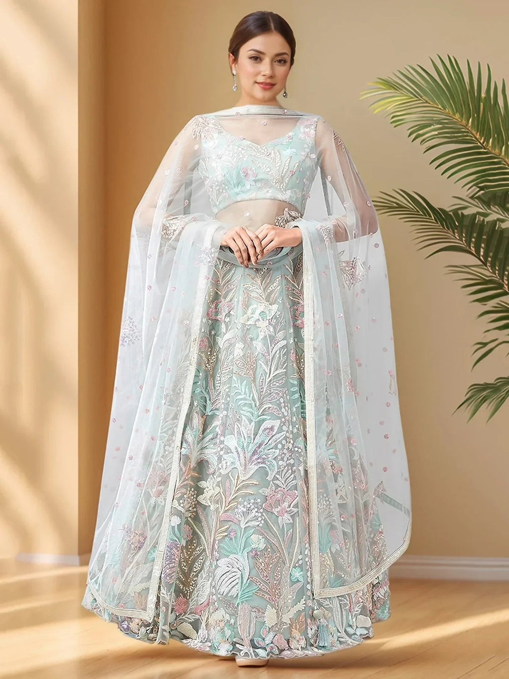 Spectacular Pista Green Sequins Net Wedding Wear Lehenga Choli
