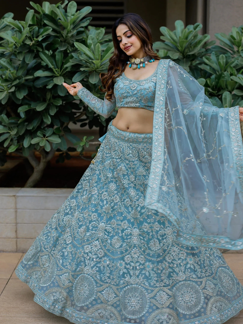 Stunning Aqua Blue Embroidered Soft Net Occasion Wear Lehenga Choli