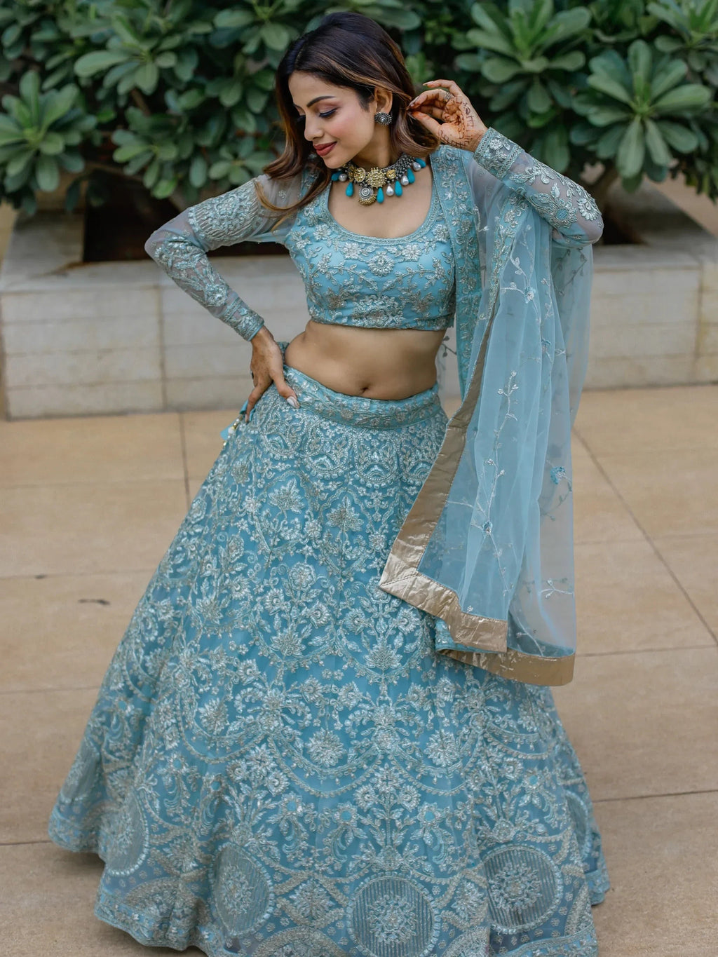 Stunning Aqua Blue Embroidered Soft Net Occasion Wear Lehenga Choli