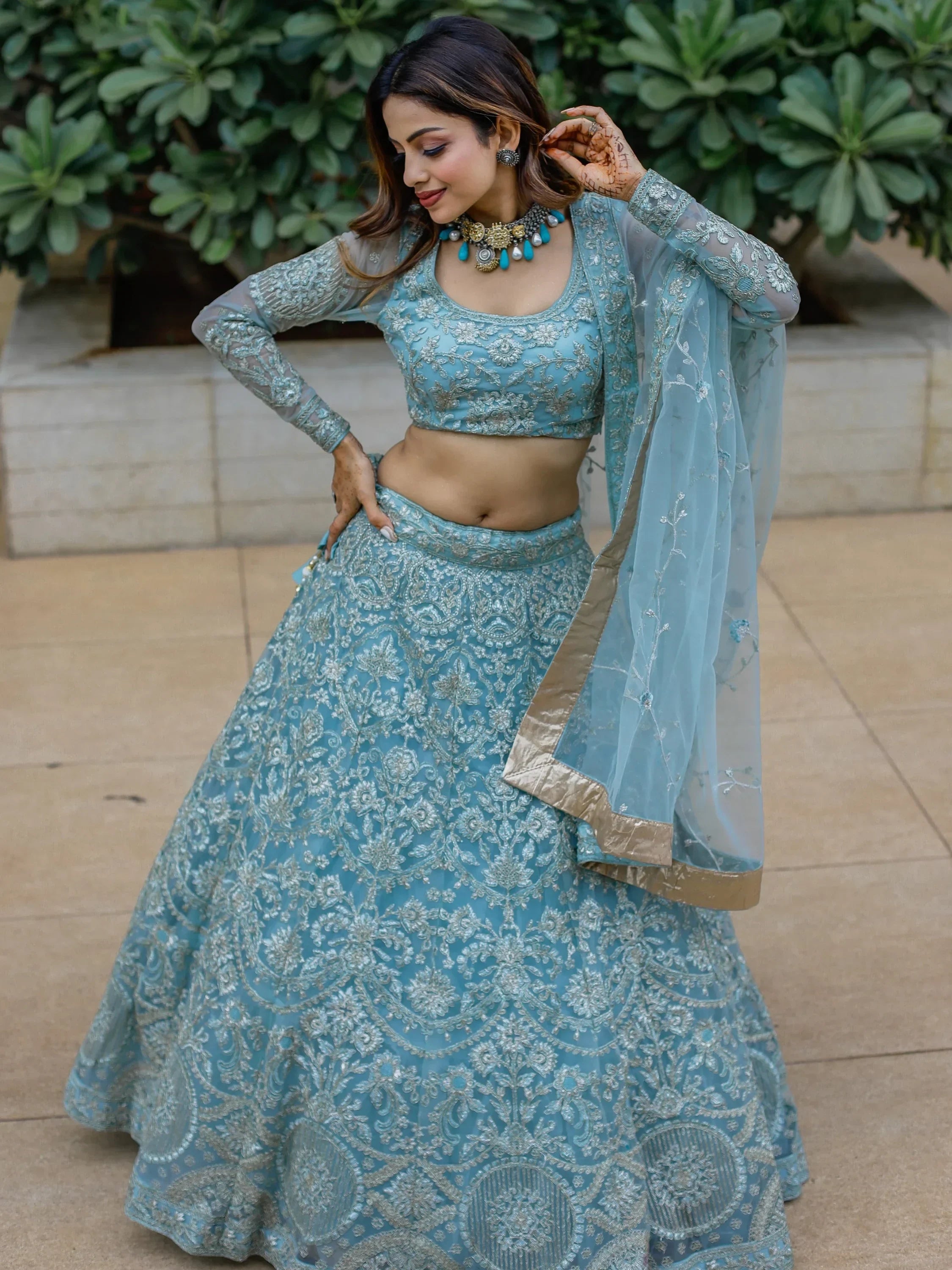 Stunning Aqua Blue Embroidered Soft Net Occasion Wear Lehenga Choli