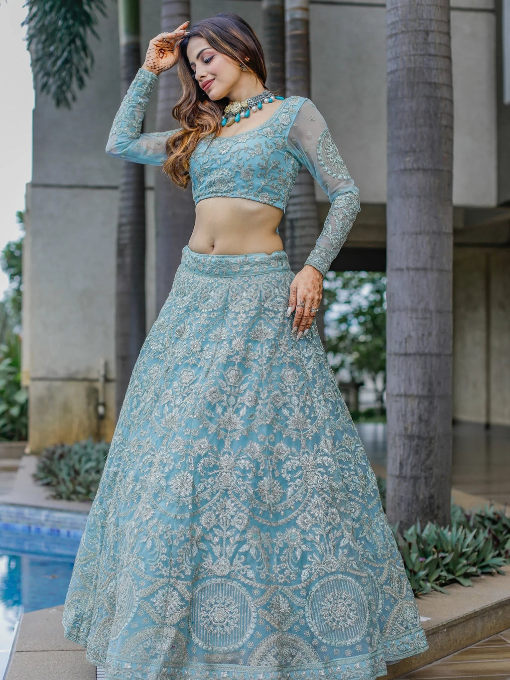 Stunning Aqua Blue Embroidered Soft Net Occasion Wear Lehenga Choli