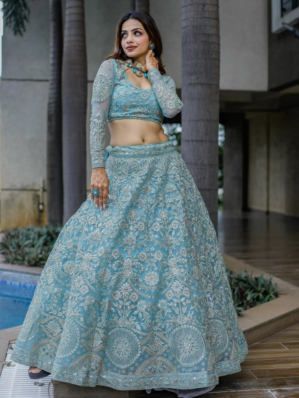 Stunning Aqua Blue Embroidered Soft Net Occasion Wear Lehenga Choli