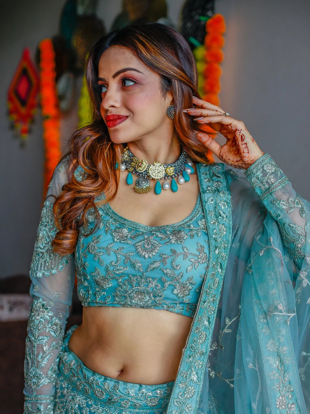 Stunning Aqua Blue Embroidered Soft Net Occasion Wear Lehenga Choli