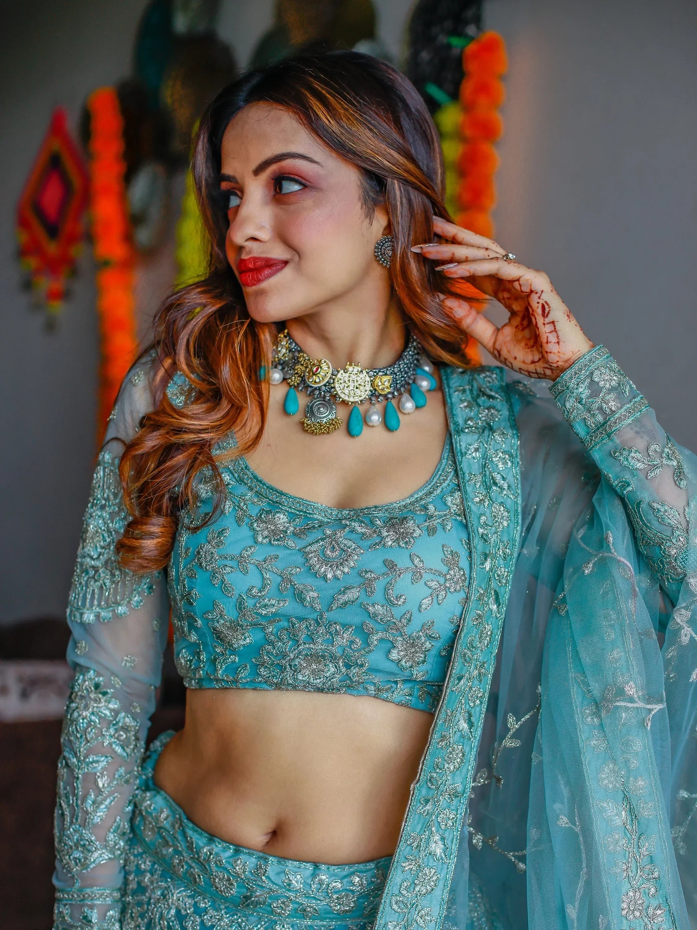 Stunning Aqua Blue Embroidered Soft Net Occasion Wear Lehenga Choli