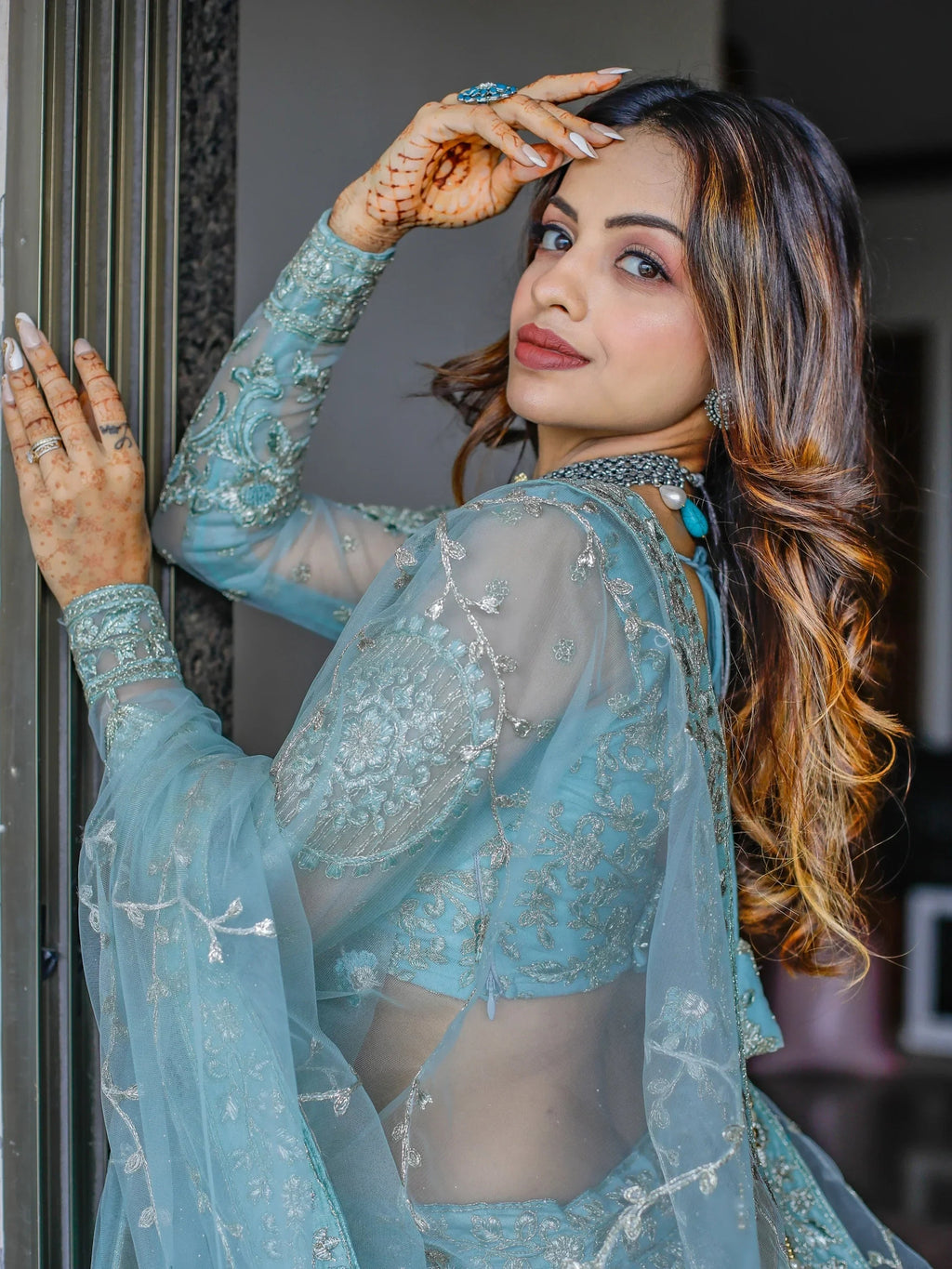 Stunning Aqua Blue Embroidered Soft Net Occasion Wear Lehenga Choli