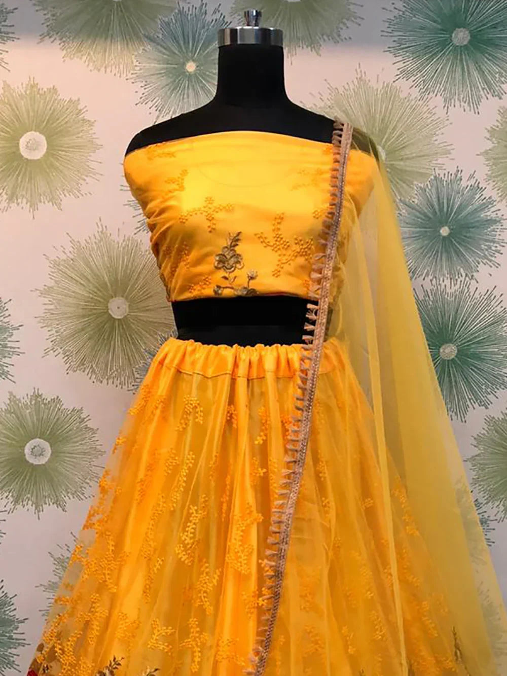 Stunning Yellow Thread Work Net Wedding Wear Lehenga Choli