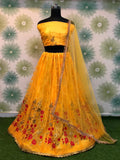 Stunning Yellow Thread Work Net Wedding Wear Lehenga Choli