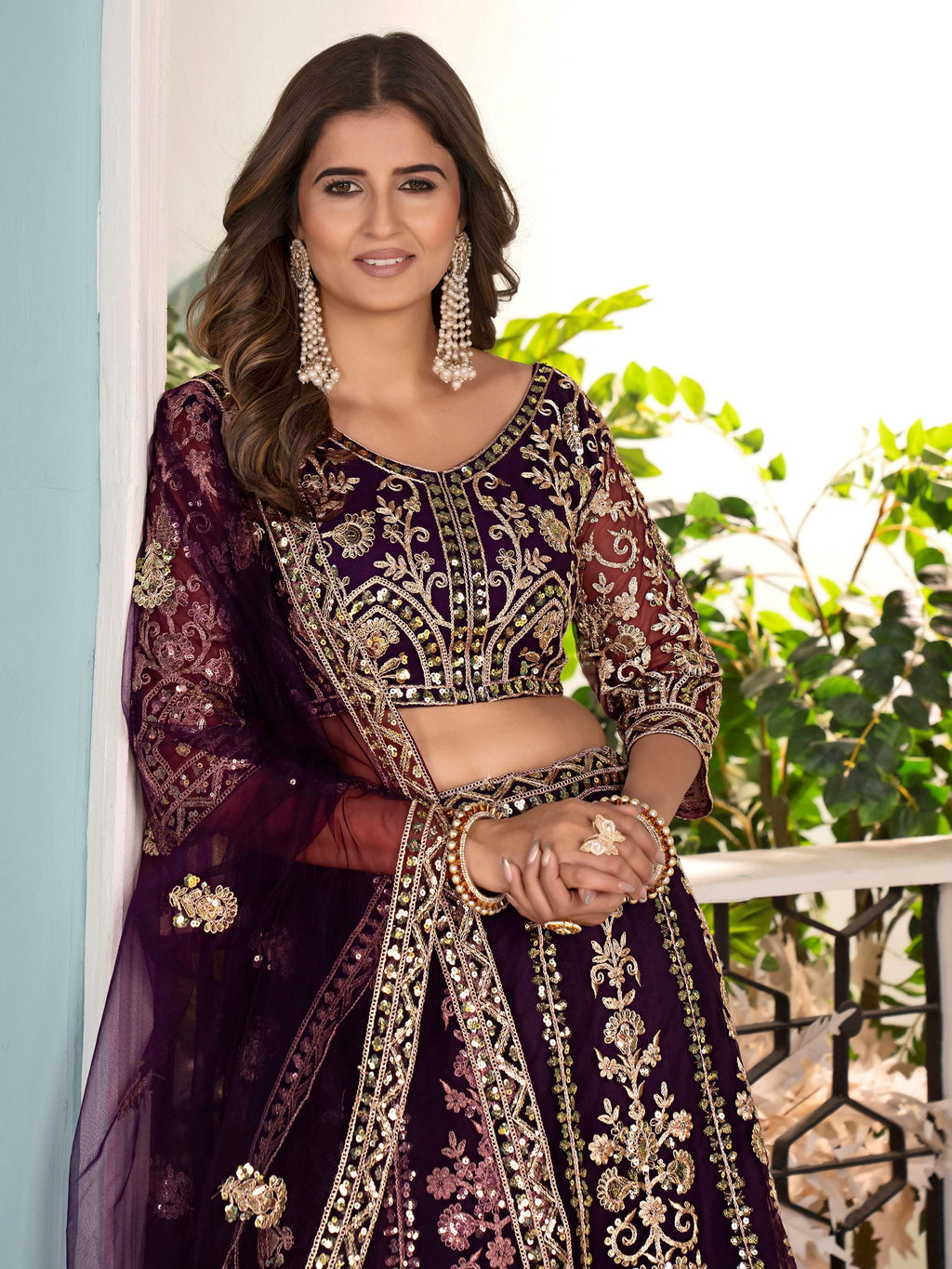 Wine Captivating Net Sequins Embroidered Bridesmaid Lehenga Choli