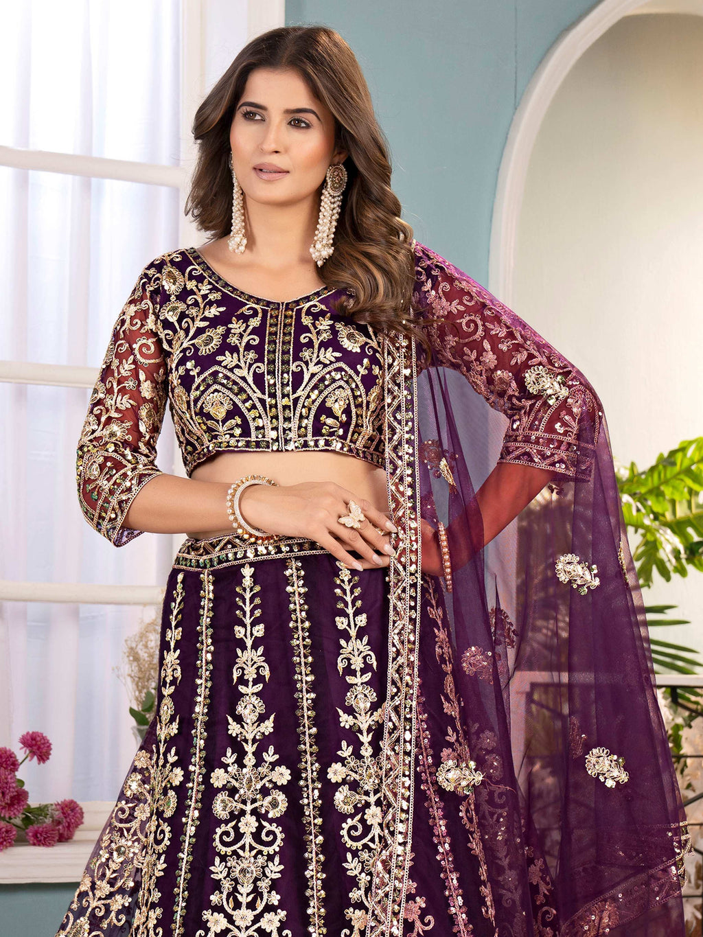 Wine Captivating Net Sequins Embroidered Bridesmaid Lehenga Choli
