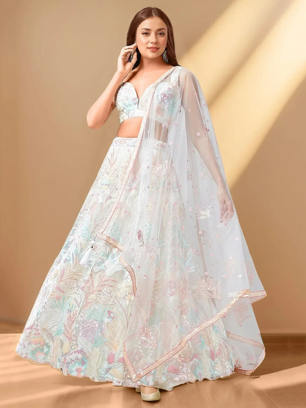 Wonderful Off-White Sequins Net Reception Wear Lehenga Choli