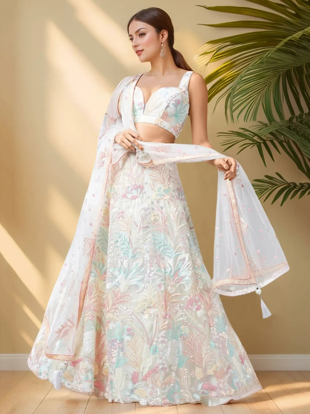 Wonderful Off-White Sequins Net Reception Wear Lehenga Choli
