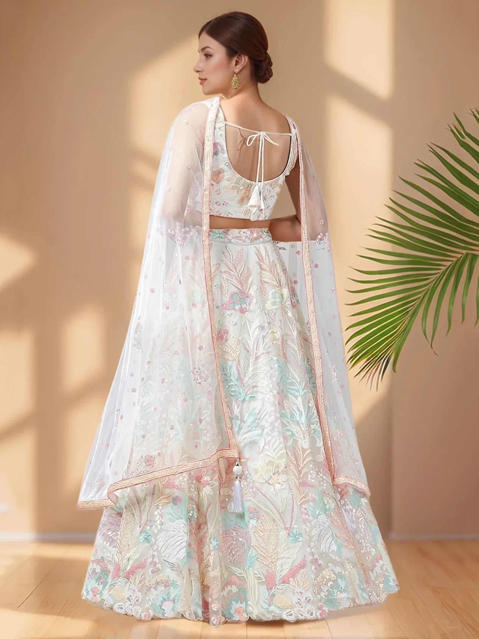 Wonderful Off-White Sequins Net Reception Wear Lehenga Choli