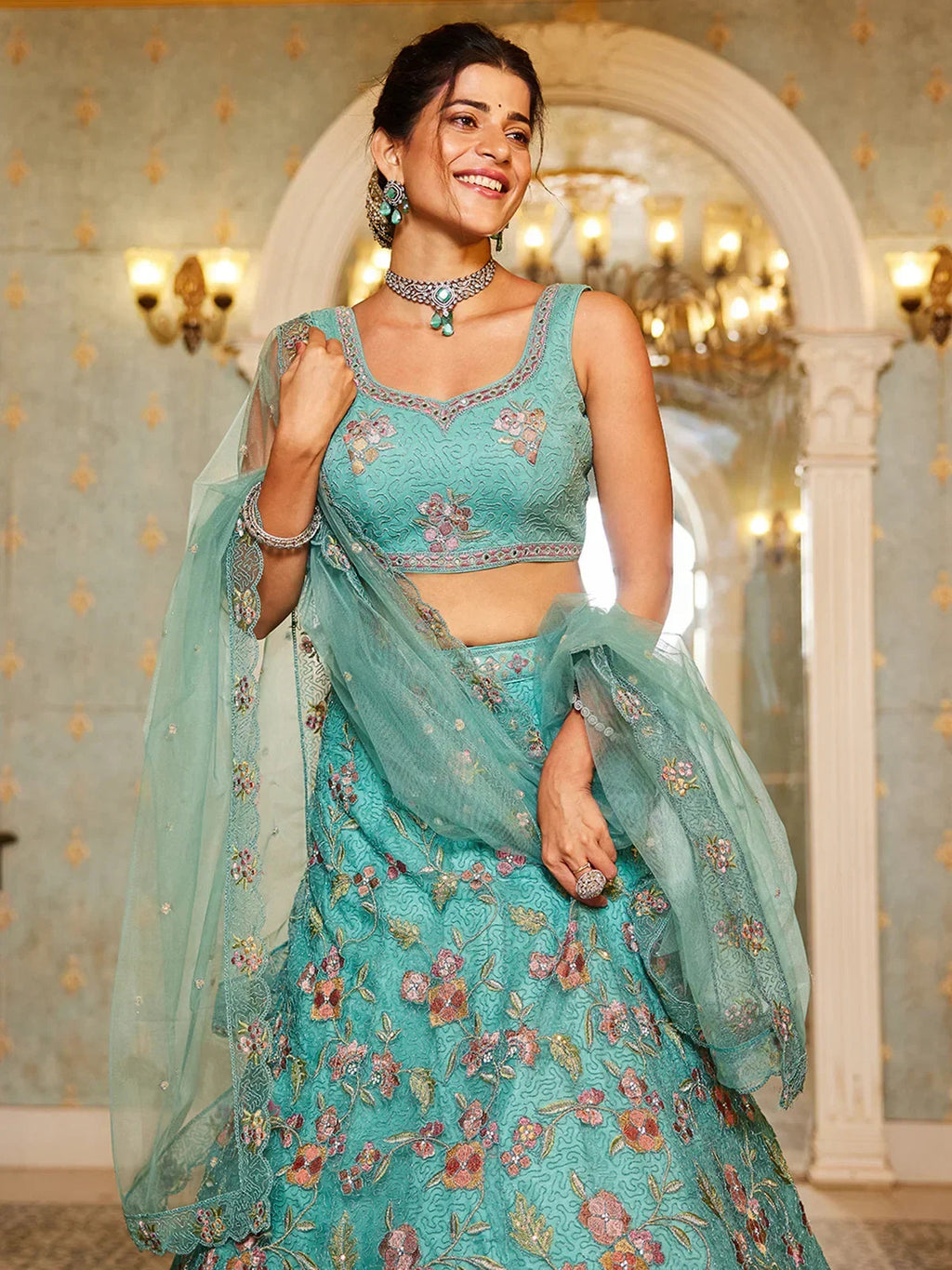 Wonderful Sea Green Embroidered Net Engagement Wear Lehenga Choli