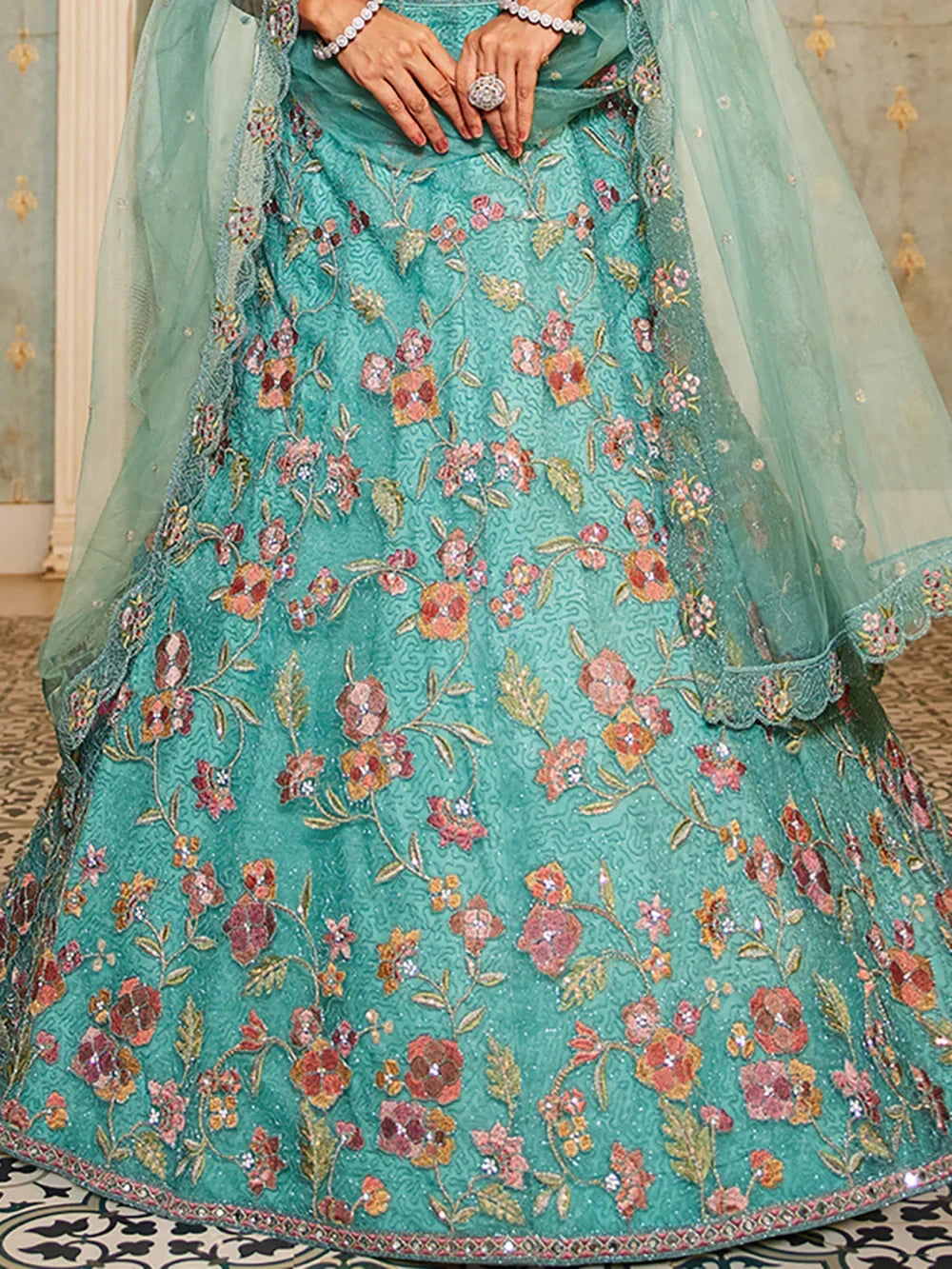 Wonderful Sea Green Embroidered Net Engagement Wear Lehenga Choli