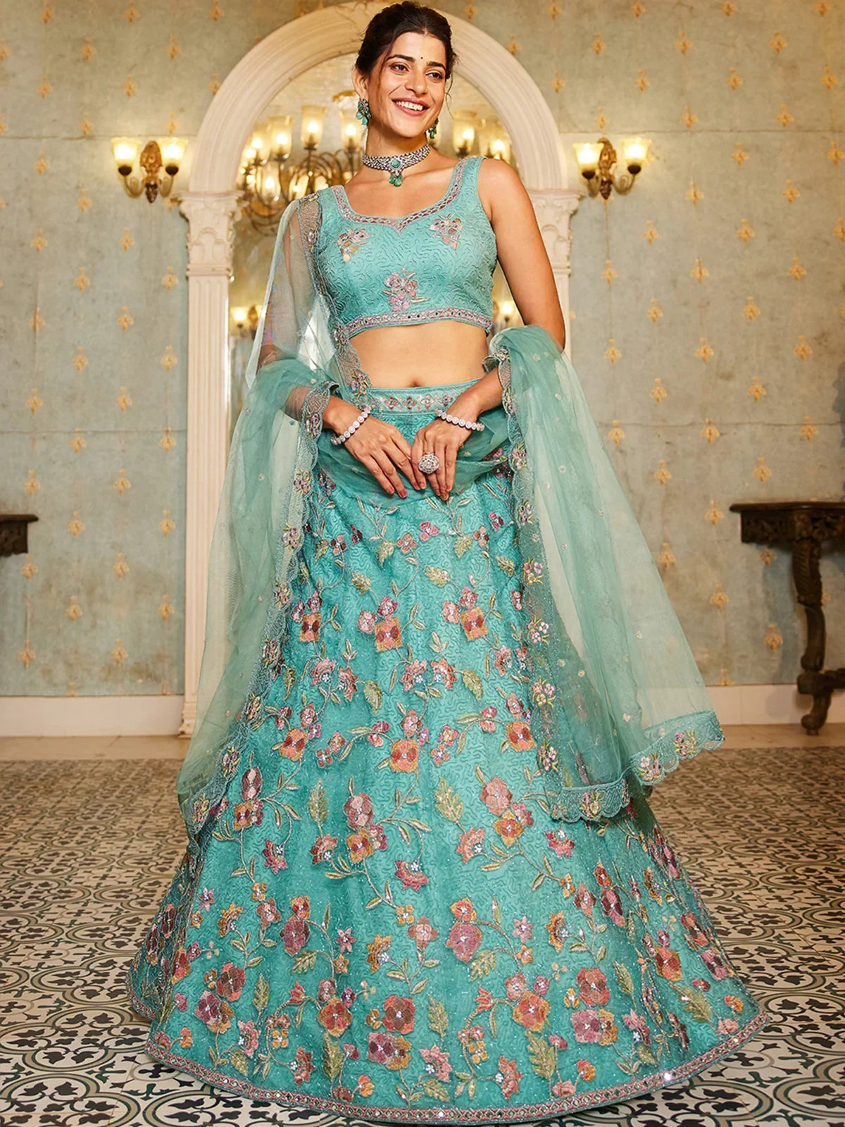Wonderful Sea Green Embroidered Net Engagement Wear Lehenga Choli