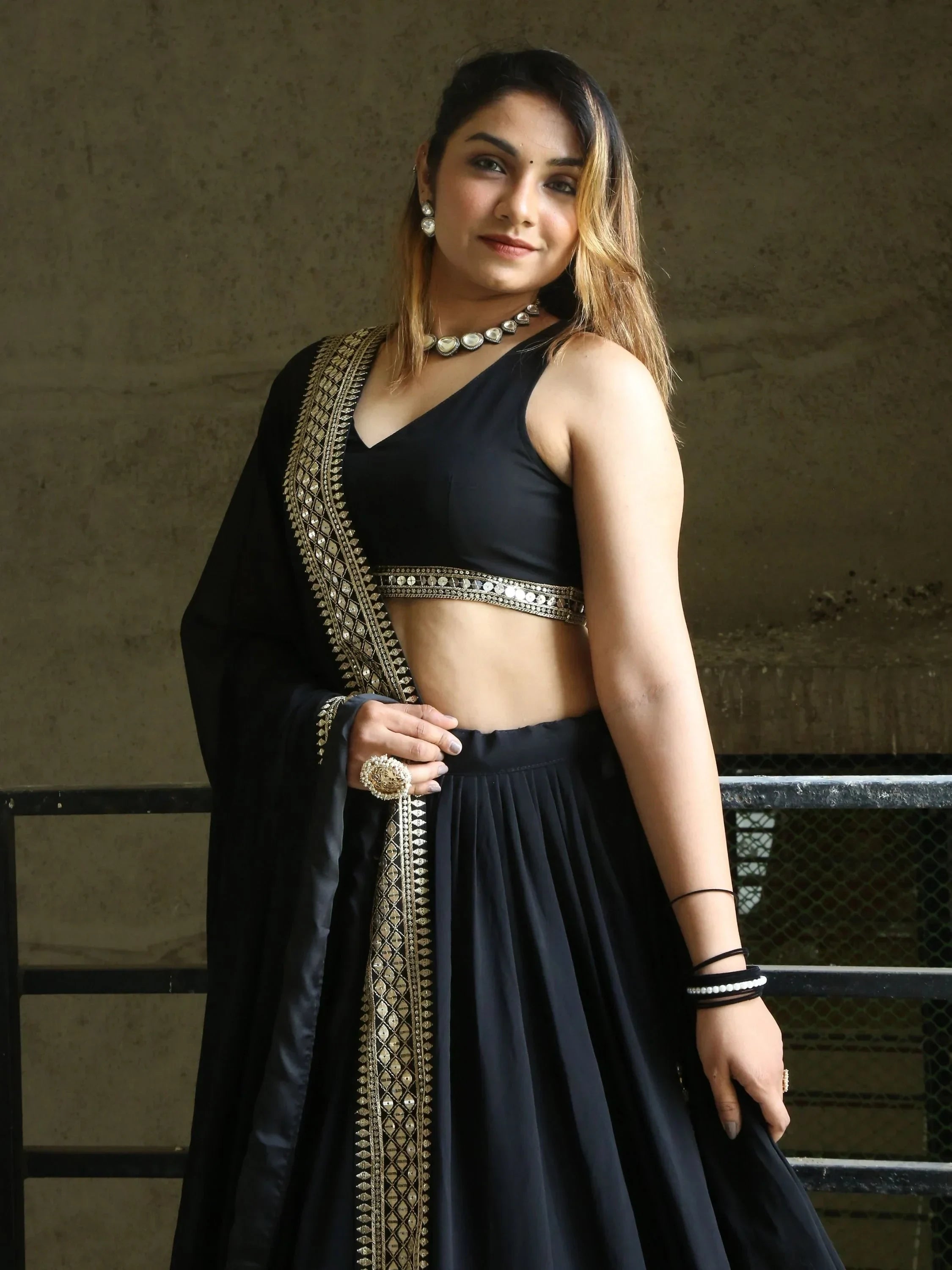 Pretty Black Heavy Lace Work Georgette Reception Wear Lehenga Choli