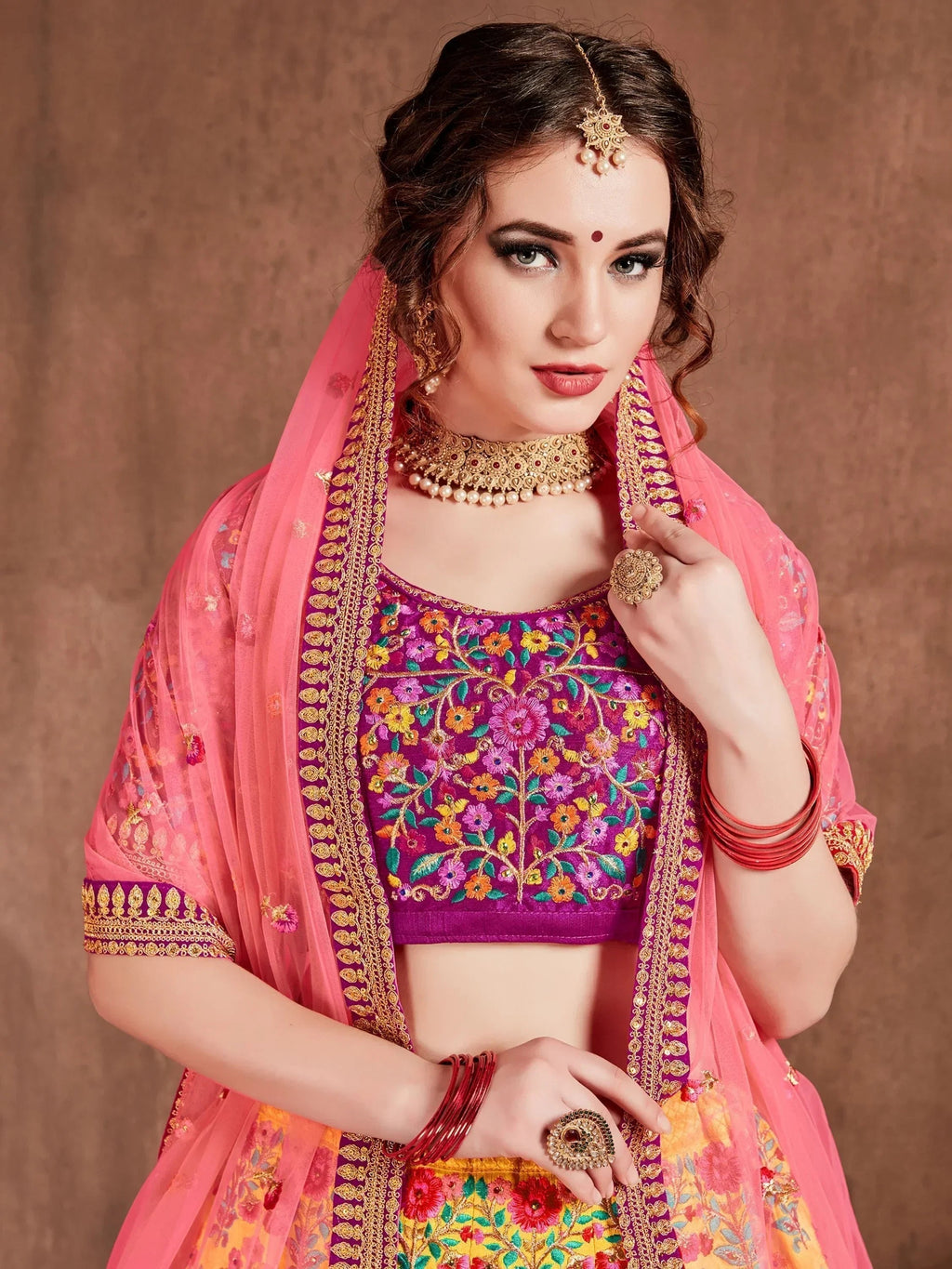 Yellow Heavy Embroidered Silk Wedding Lehenga Choli