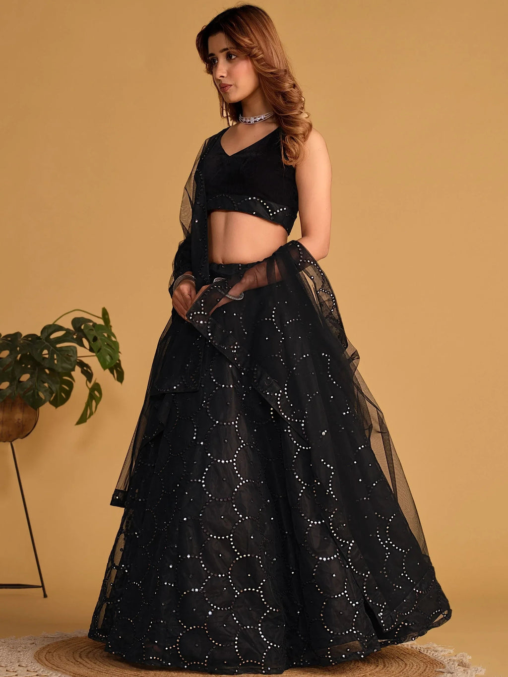Mesmerizing Black Mirror Work Organza Reception Wear Lehenga Choli