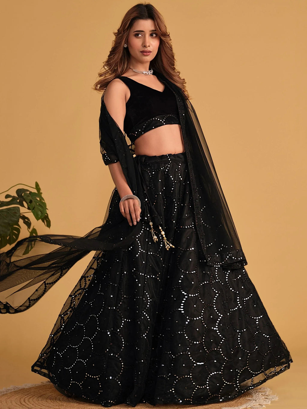 Mesmerizing Black Mirror Work Organza Reception Wear Lehenga Choli