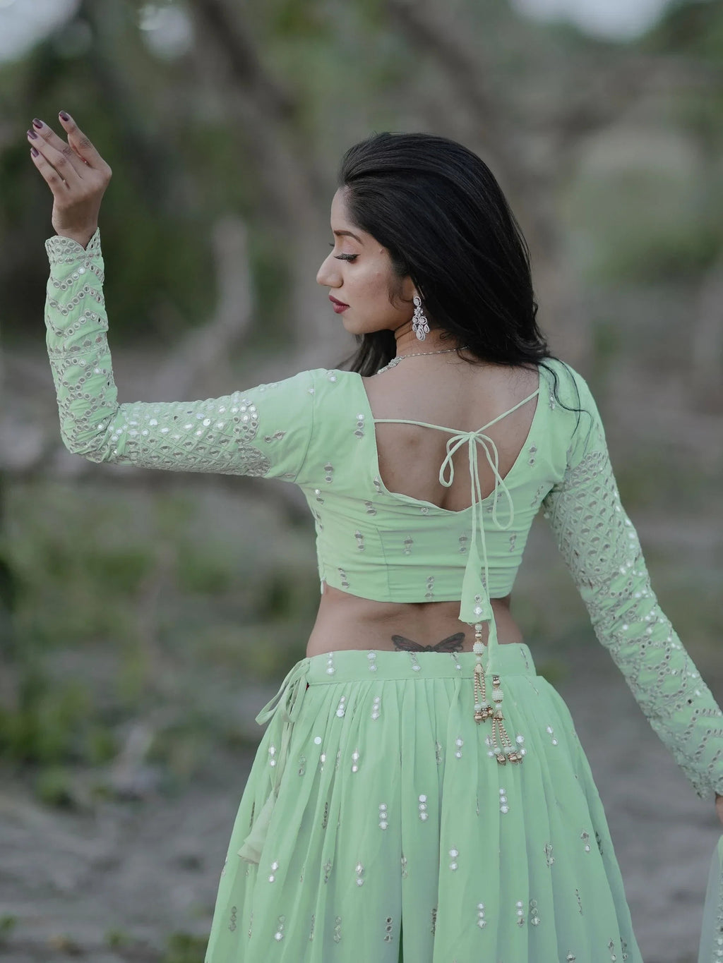Adorable Pastel Green Sequins Georgette Reception Wear Lehenga Choli