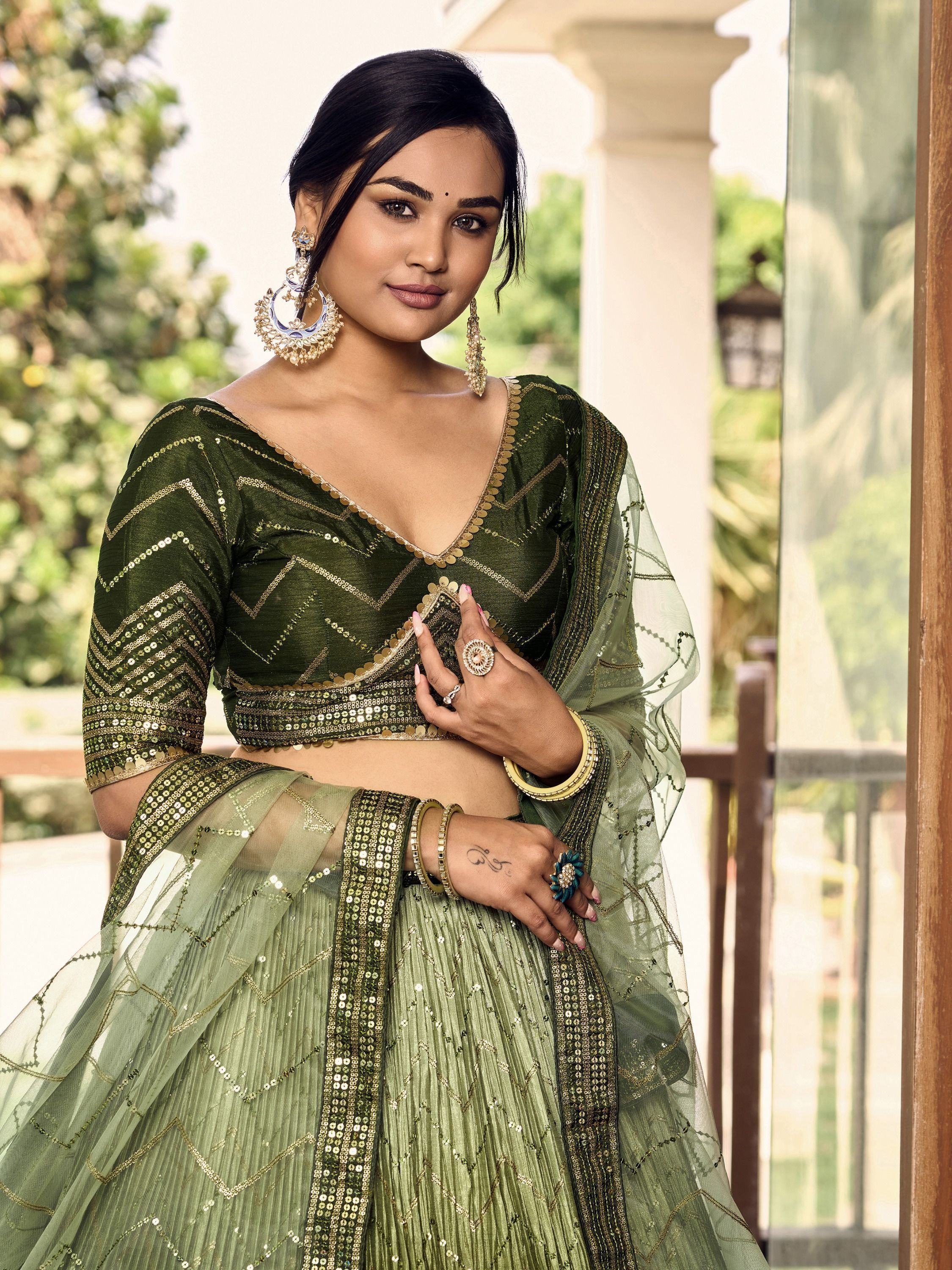 Awesome Green Sequins Chinon Mehendi Wear Lehenga Choli