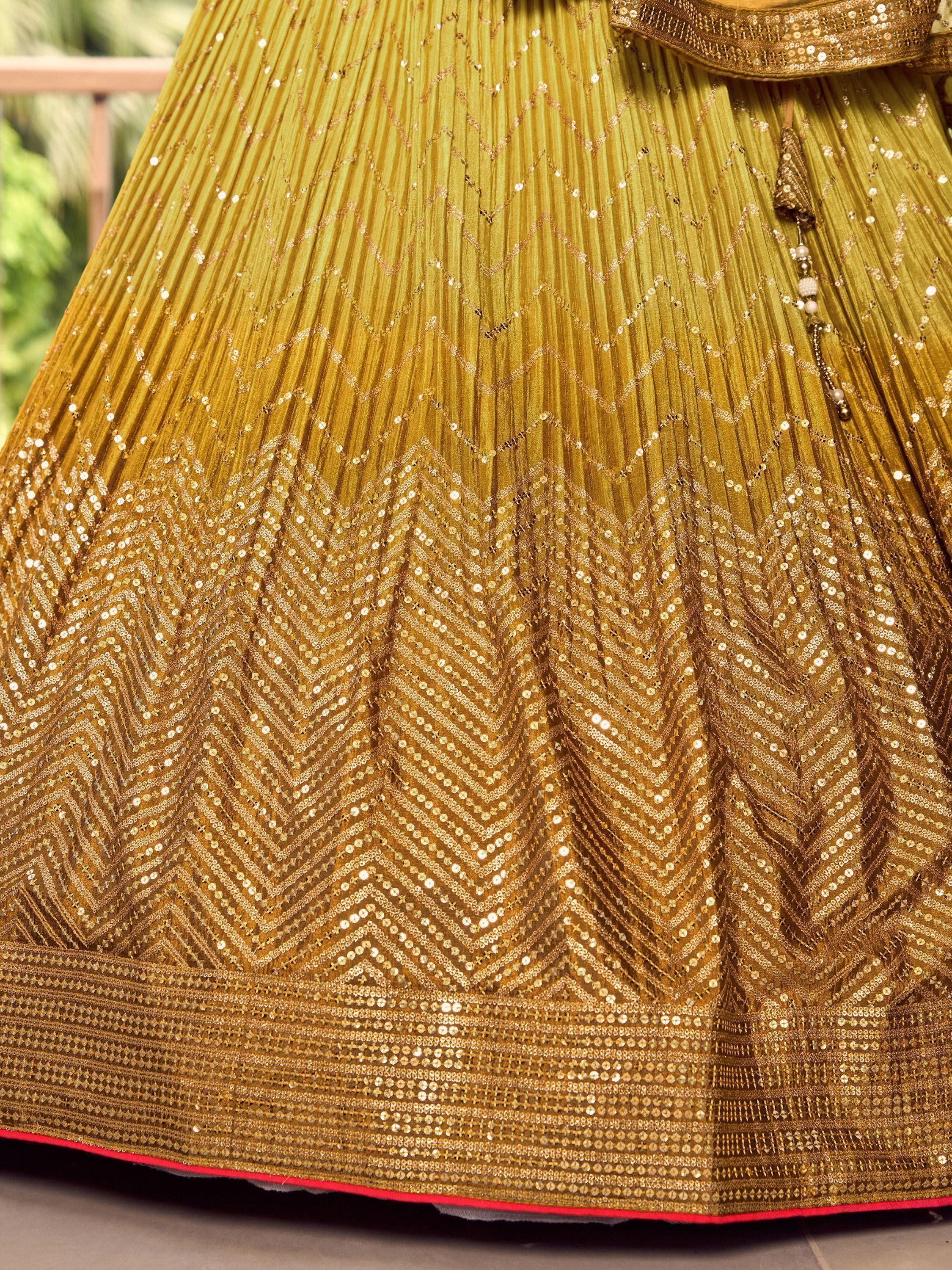 Outstanding Yellow Sequins Chinon Haldi Wear Lehenga Choli