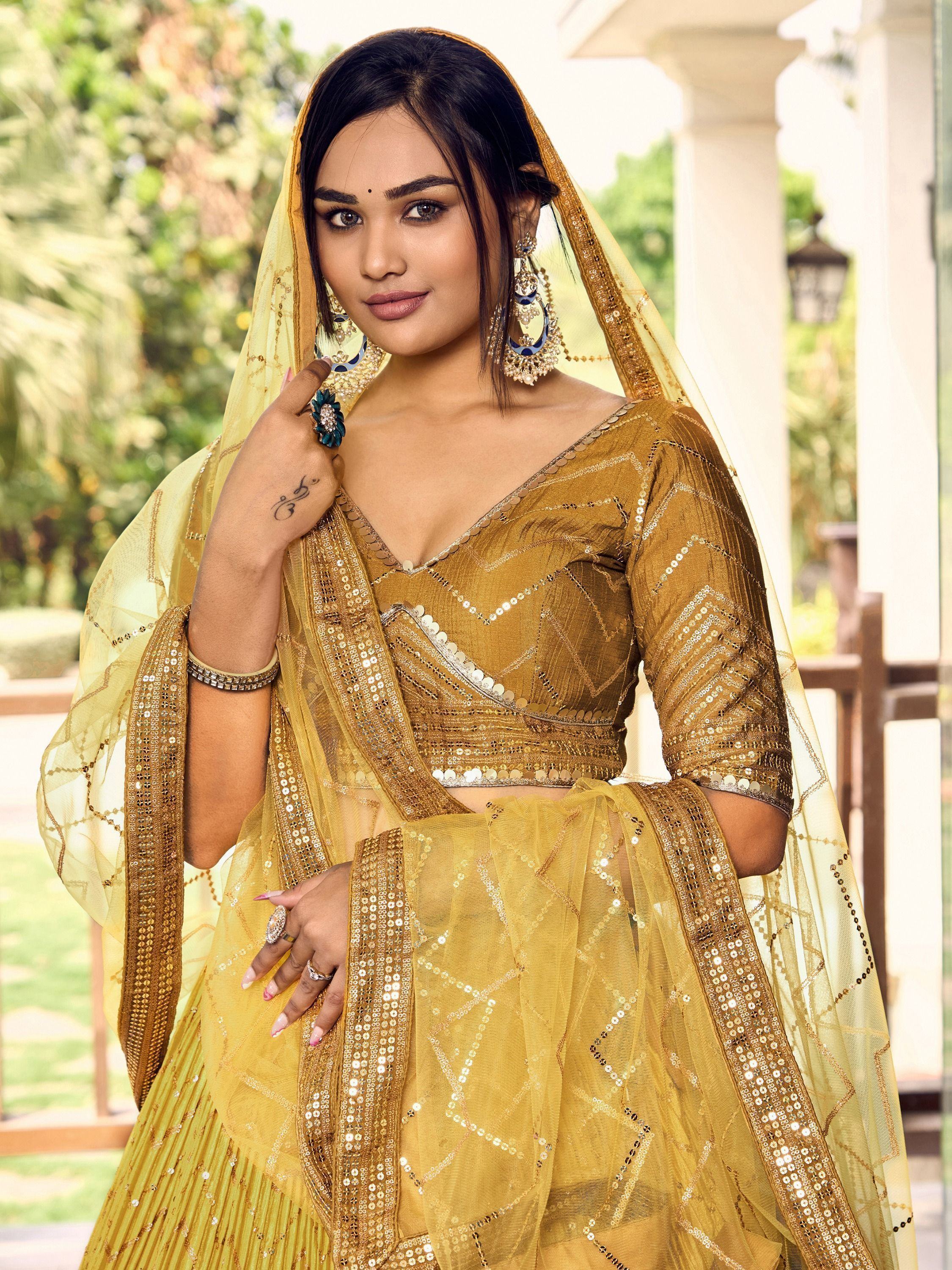 Outstanding Yellow Sequins Chinon Haldi Wear Lehenga Choli