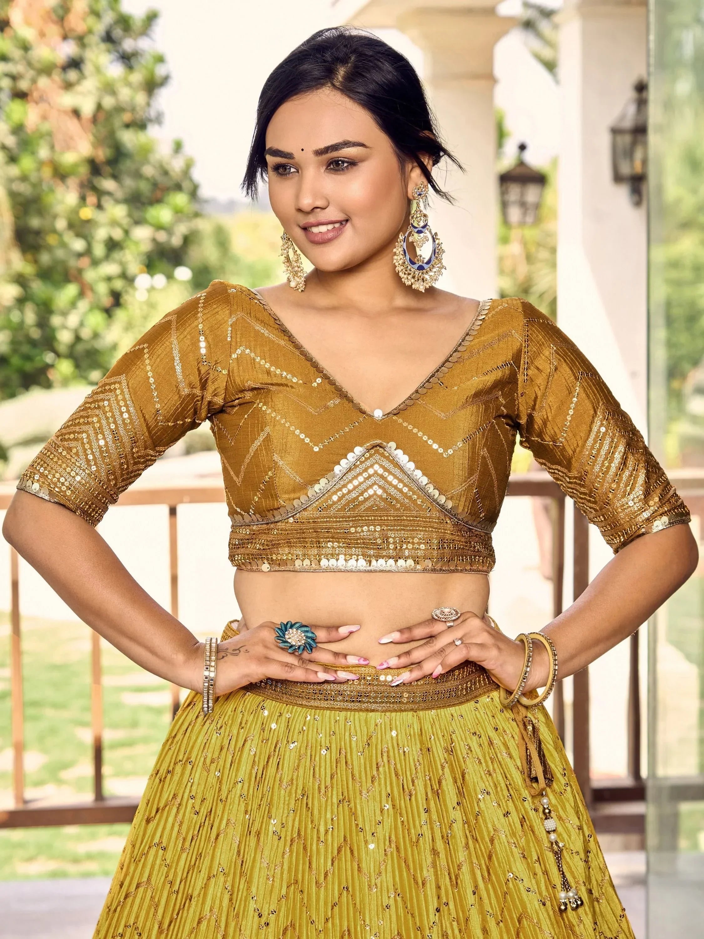 Outstanding Yellow Sequins Chinon Haldi Wear Lehenga Choli